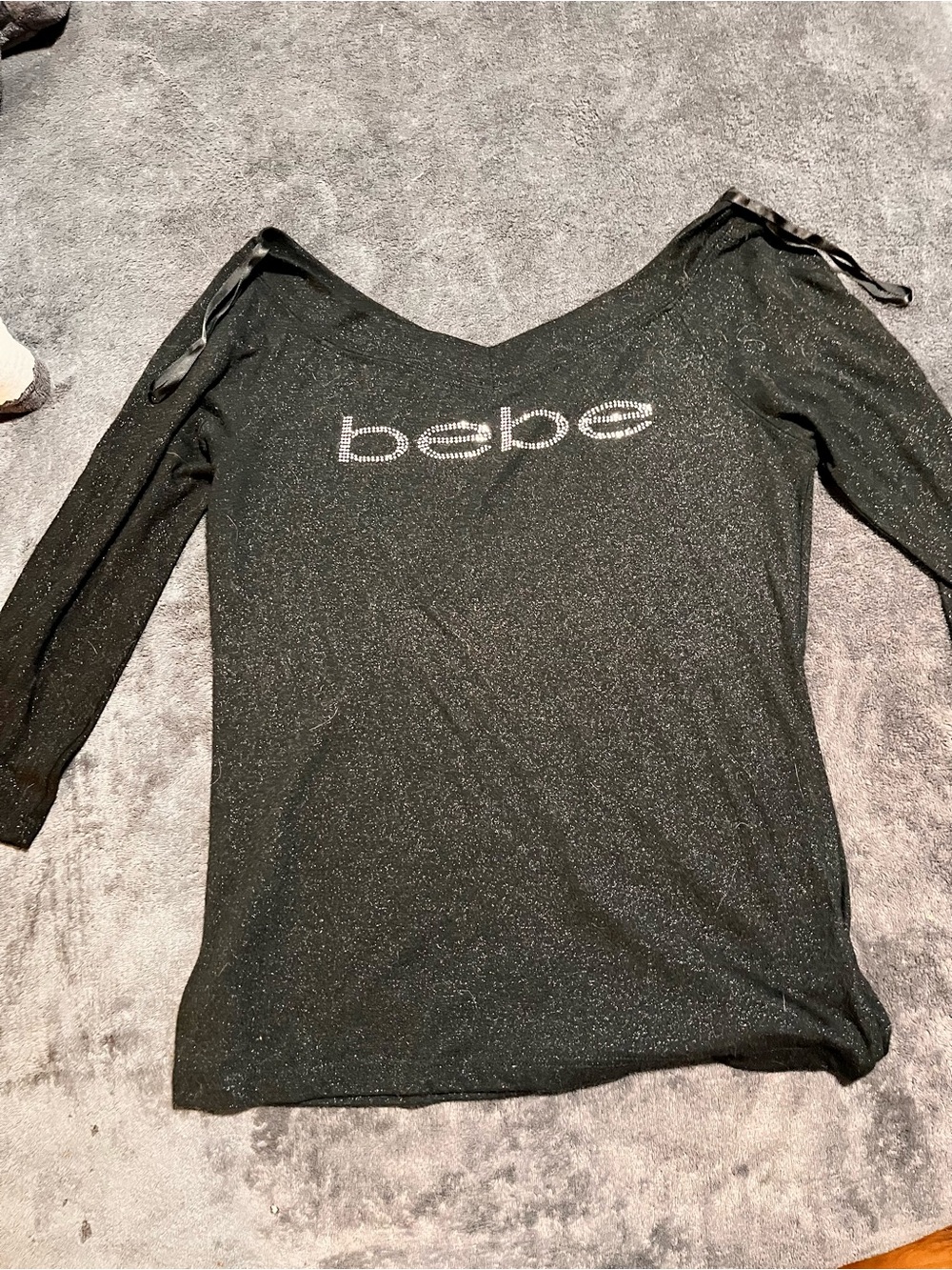 bebe Black Off-Shoulder Sparkle Long Sleeve Top with Crystal Logo